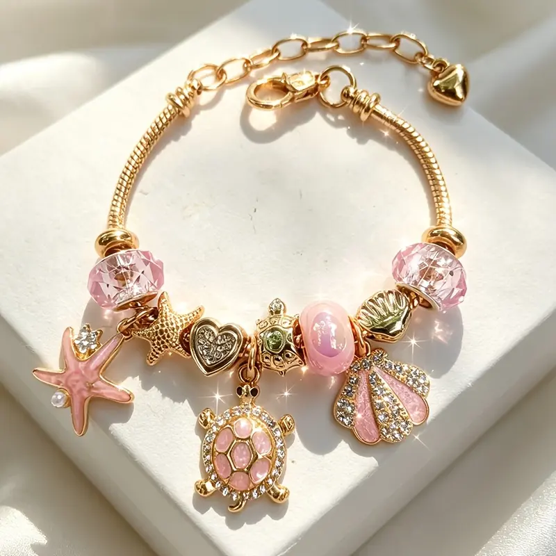 Women's Adjustable Pink Golden Sea Bracelet with Shell Pendant & Iridescent Beads - Starfish, Heart, Turtle Charms Suitable for Birthdays, Weddings, Parties, Casual Attire - January//March/-month Birthstone Gift