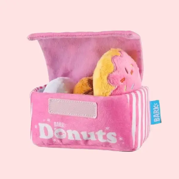 Serve up sweet playtime with the BarkBox Barker's Dozen Donuts 4-in-1 Dog Toy, featuring interactive plush donuts for maximum engagement.