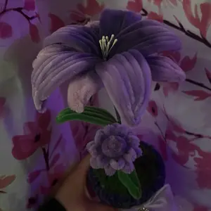 Purple Lily Flower Arrangement with Green Leaves and Purple Blossoms for Decorative Display