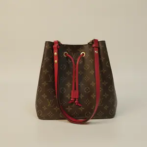 Pre-owned Louis Vuitton Monogram Bucket Bag Handheld Shoulder Classic Canvas Durable Coated Roomy Slouchy Adjustable Leather Strap Drawstring Closure