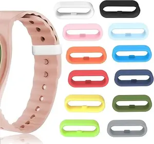 colorful silicone band keeper clips compatible with fitness trackers and magic band design for secure and comfortable fit