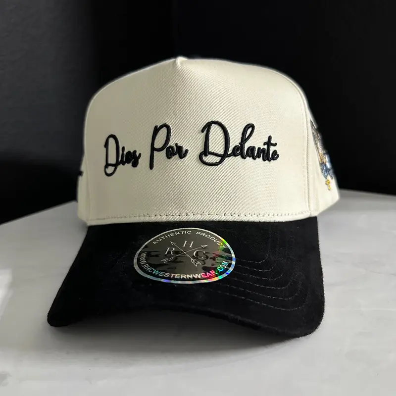 Dios Por Delante Hat with Embroidered Text, Adjustable Fit, Adjustable Strap, and Black Lace Detail
