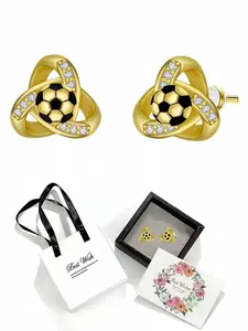 Celtic Footprint · Golden Pact Celtic knot football stud earrings with delicate drawer-style jewelry box. Ideal gift for women on birthdays, Mother's Day, Valentine's Day, Christmas and anniversaries.