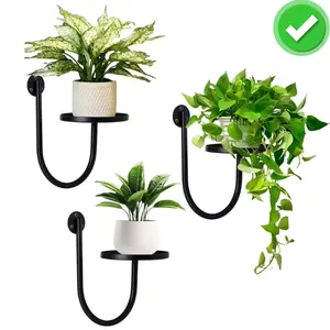 Set of 3 wall-mounted plant holders: Metal shelves for hanging potted plants.