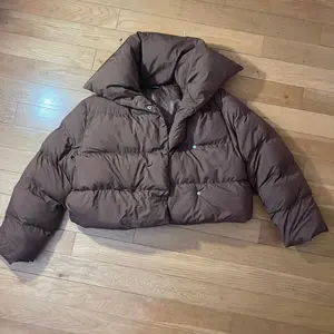 brown puffer cropped coat