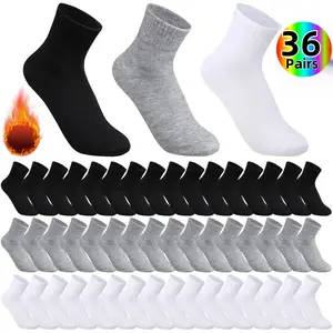H   6-18-36 Pairs Unisex Crew Socks   Soft, breathable, with elastic ribbed cuffs. All-season comfort for running, gym, casual wear; in black/white/gray. Versatile styles (all-season, vintage, etc.) — great holiday gifts. Fiber socks for women