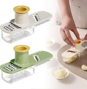 2PC Multifunctional Garlic Grinder & Mandoline Slicer, 2026 New 4 in 1 Garlic Slicer Mincer Crusher Tool, Vegetable Mandoline Cutter with Container, Kitchen Gadgets (Mix)