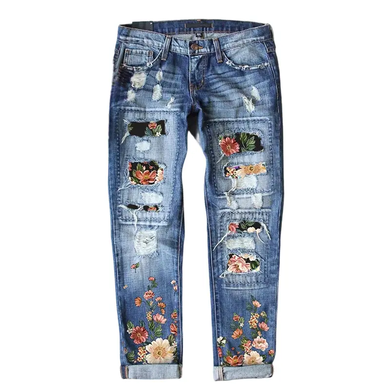 Women’s vintage distressed denim jeans — washed long pants with cherry blossom floral appliqué embroidery; unique patchwork design that flatters the figure; ideal for Valentine’s Day