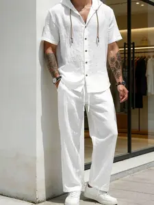 Men’s fashion two-piece summer set with a hood, casual minimalist style, loose breathable fabric—hoodie and wide-leg pants—suitable for vacations and everyday wear.