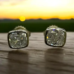 2.03 Carat Cushion Cut Bezel set earrings with Yellow Gold.