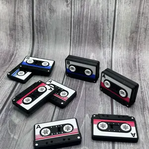 Fidget magnet cassette tapes and holder