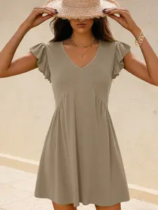 A women's solid color beach leisure casual wear deep V-neck pleated ruffled lotus sleeve loose vest dress, suitable for summer, suitable for daily outing, seaside recreation, party.
