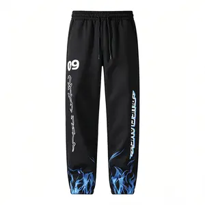 Men’s black printed joggers with panel design, loose straight-leg fit, drawstring, suitable for outdoor casual wear and hip-hop style.