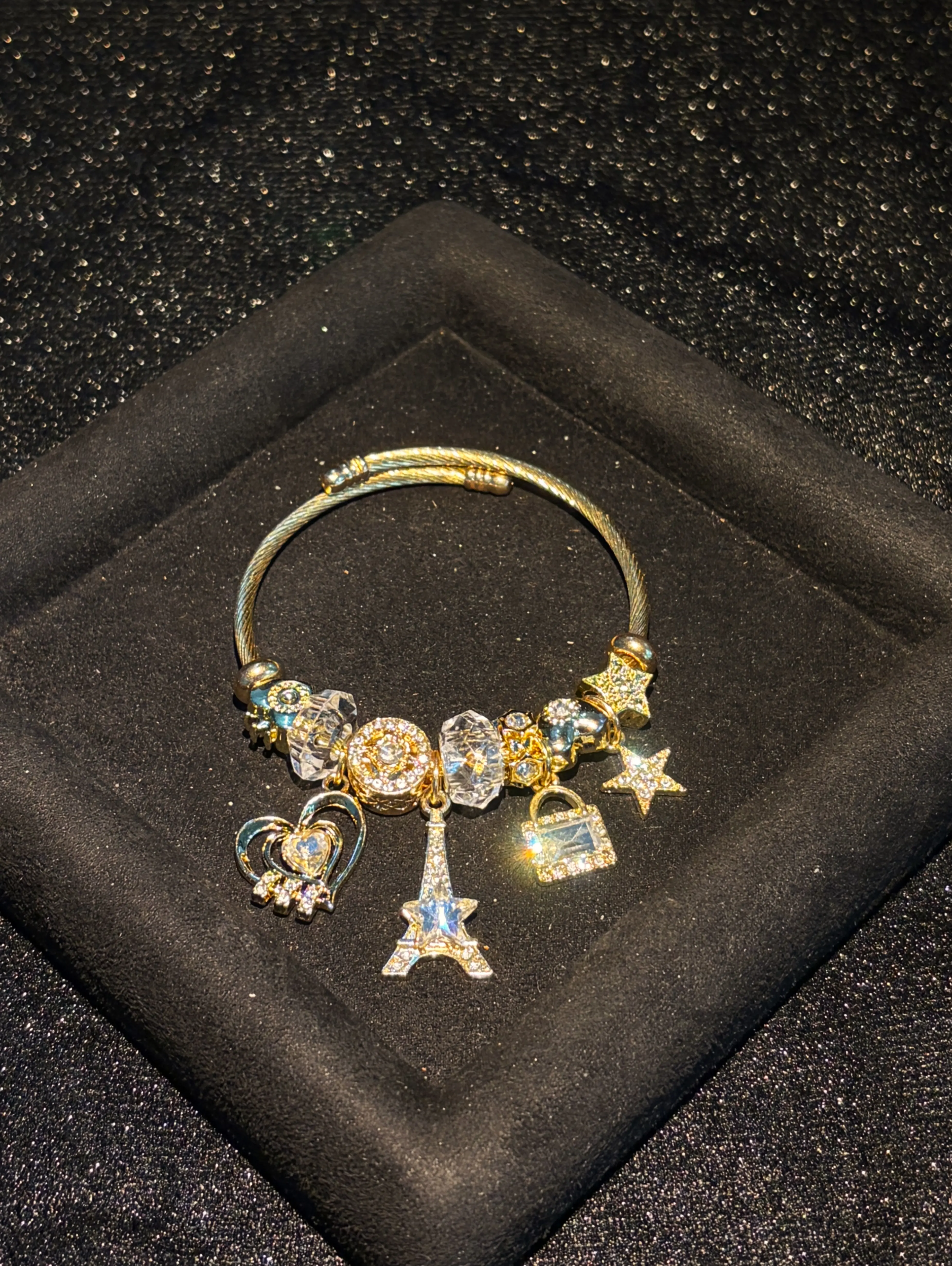 Women’s Stackable Charm Open Cuff Bangle, Gold‑Tone Adjustable Wrist Bangle with Eiffel Tower, Padlock, Heart & Star Rhinestone Dangle Charms, Sparkly Crystal Beaded Bracelet, Trendy Travel‑Inspired Jewelry Present for Ladies Teen Girls