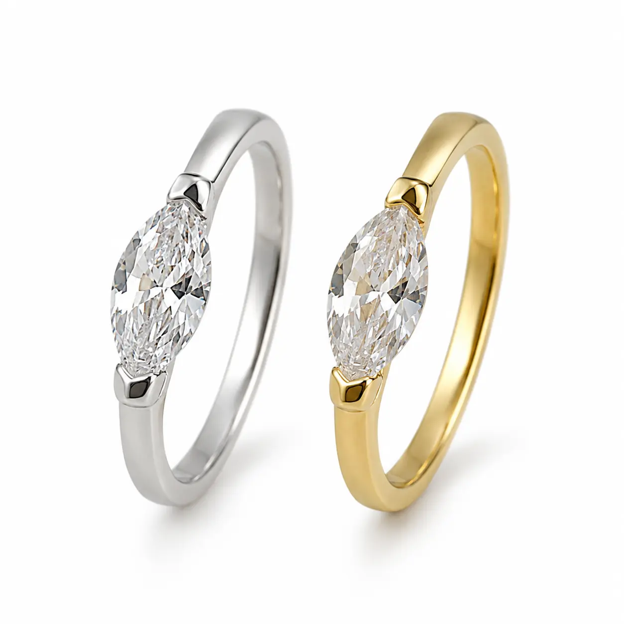 Marquise-cut ring with an icy, brilliant look and a saddle-style design; D/VVS1 clarity; a sparkling engagement ring perfect for proposals or anniversaries; available in sizes 5–10.