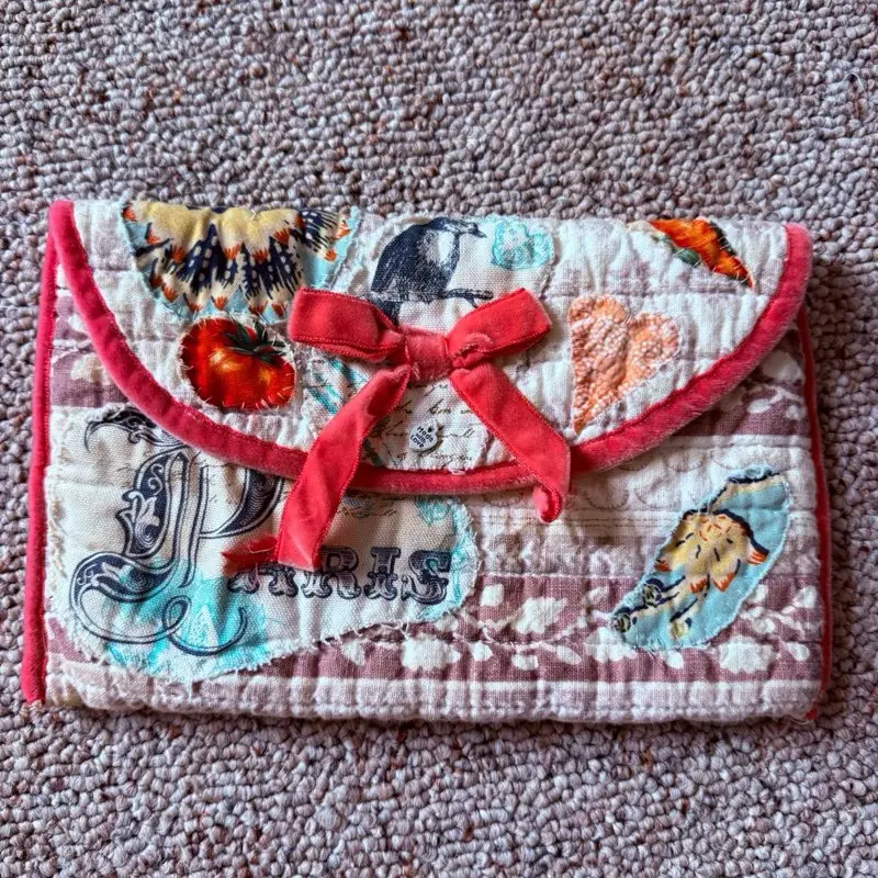 Quilted Clutch bag with snap closure and boho style in tea dyed fabric and velvet ribbon trimt