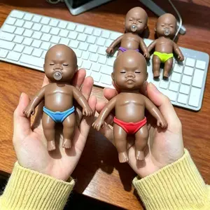 Hand-shaped doll, gentle squeeze of Natasha figurine, black baby doll with realistic features, bubble-spitting toy for release, black race toy.The color of the pants is random.