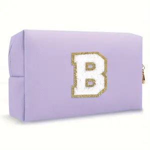 Purple lightweight nylon makeup bag with chenille letter patch