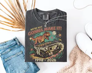 We’re Not Gonna Make It Dinosaur Theme Park Inspired T-Shirt, Funny Iguanodon Animal Kingdom Vacation Graphic Tee, Matching Family Trip Unisex Gift