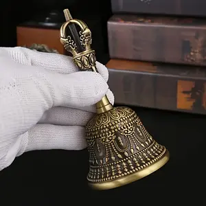 Vintage Brass Tibetan-Style Bell |     Elegant Retro Five-Pronged Design |     Intricate Patterns & Gongs |   Ideal for Ramadan, Weddings, Church, School, and Easter Celebrations Decorative Ritual Craft |     Religious Festivity, Christmas Bells, Perfect