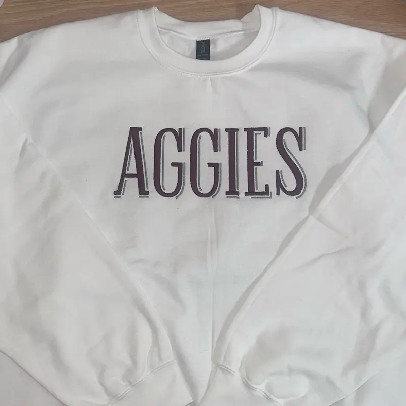 Embroidered Aggies crewneck sweatshirt. College football apparel