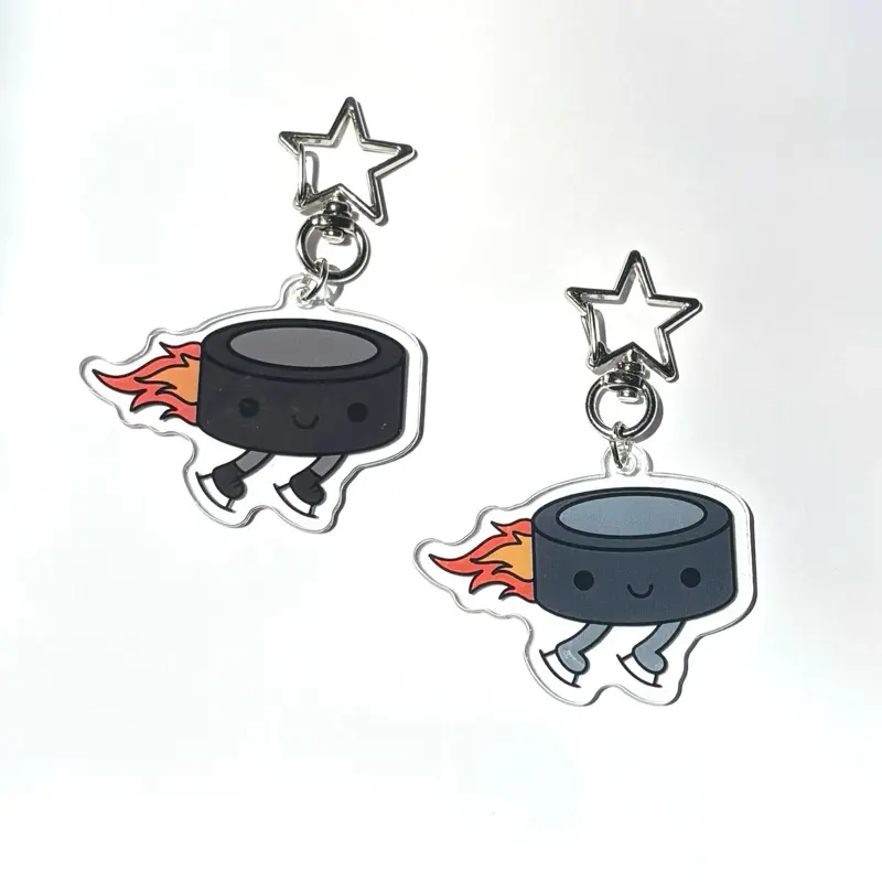 Flying Hockey Puck Acrylic Keychain
