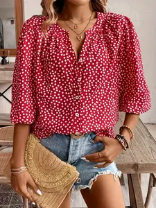 A ladies' red floral Woven V-necked lantern sleeve blouse with a fresh and sweet beachy vibe