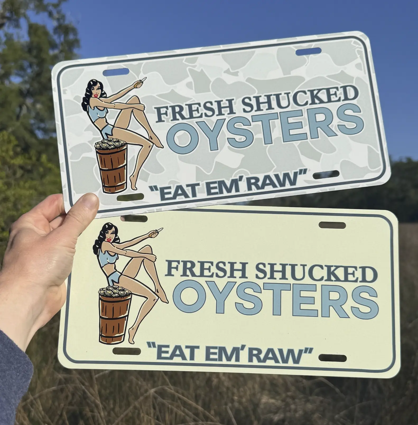 Aluminum license plates featuring images of beautiful girls, fresh oysters, and funny, unique license plates.