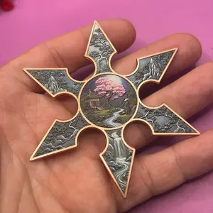 Elegant Copper Shuriken with Intricate Landscape Design and Pink Blossom Centerpiece