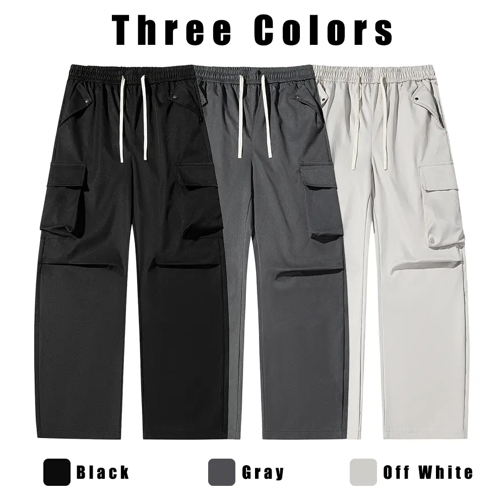 Versatile all-season cargo wide-leg pants featuring an elastic waistband with a plastic drawstring closure and symmetrical side pockets, in a retro workwear style—ideal for short trips and various occasions.