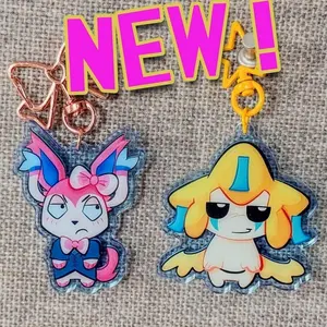 STARTERS movieunleashers keychains Double sided: Jirachi, Dr. Sylveon