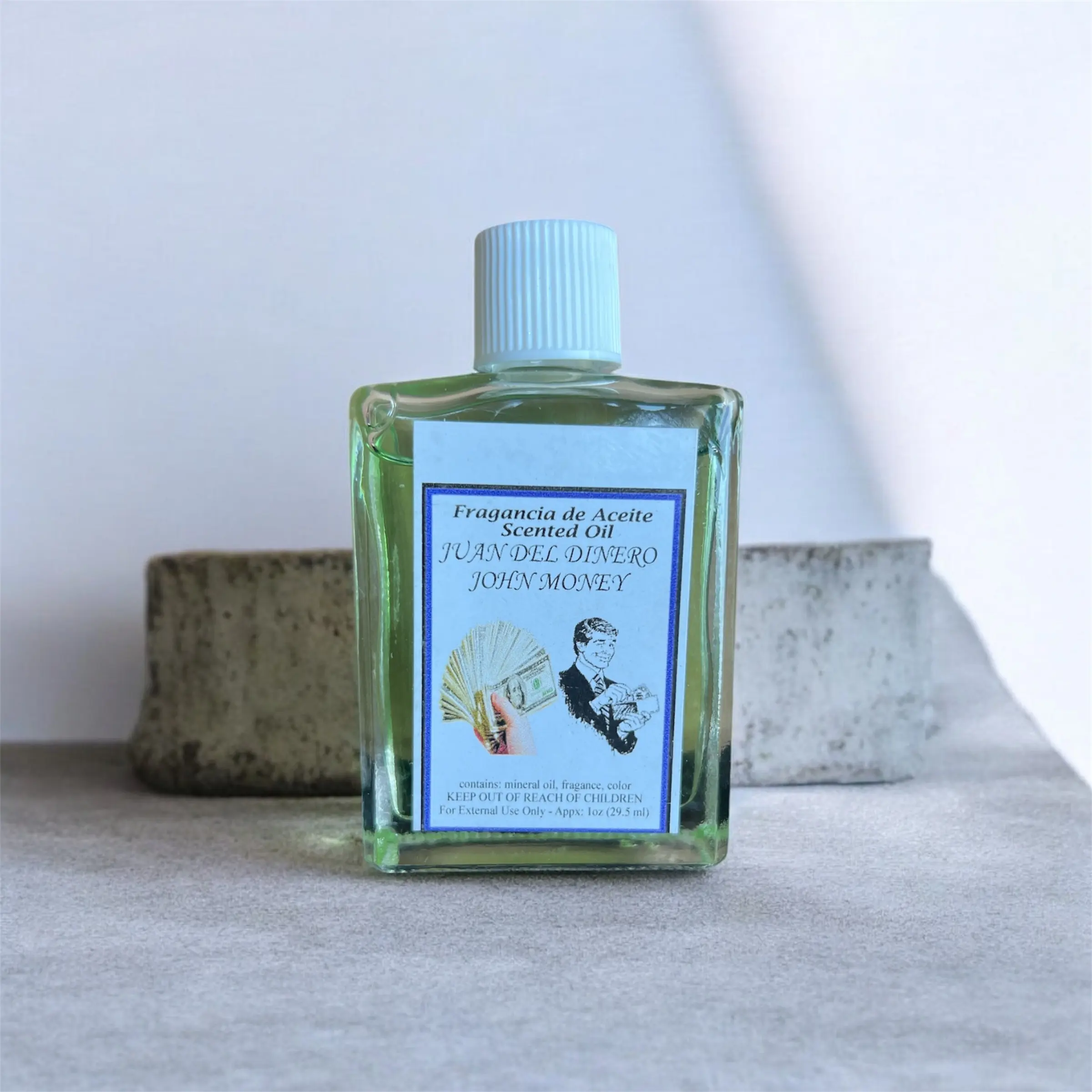 Fragancia Juan del Dinero.