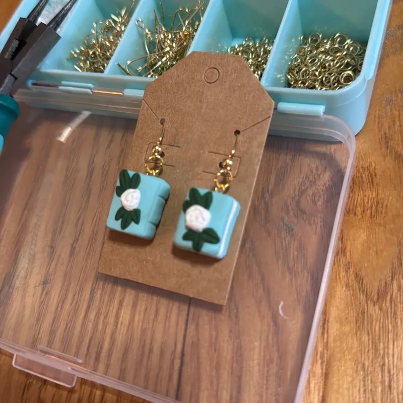 Bookish Earrings - Teal Square Design with White Floral Accent and Gold Chain
