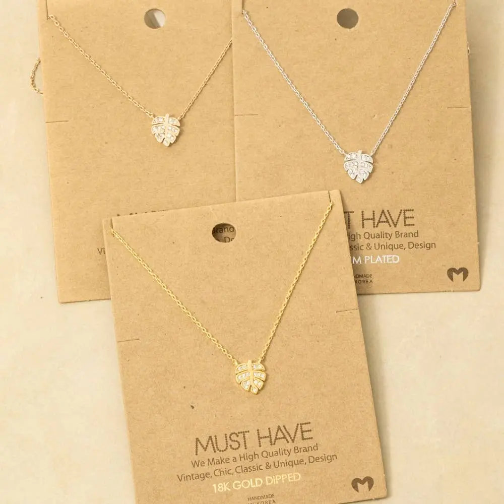 Unisex Gold-Dipped Brass-Cubic Zirconia Monstera Leaf Pendant Necklace, 16-in Casual Wear Chain, Unique Gold-Dipped Style Costume Jewelry for Celebrating Individuality (Choking Hazard: Small Parts)
