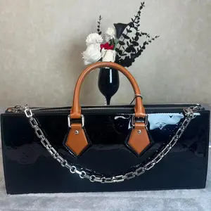 Pre-owned Louis Vuitton france Clutches & Wristlets LV Sac Tricot Shiny Vernis Evening Bag Vachetta Handle With Metal Chain YAO