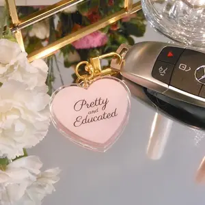 The Psych Guide Pretty and Educated Baby Pink Heart-Shaped Keychain - 2.5 Inches, Acrylic, Clip, Cute Accessory for Students keychains women