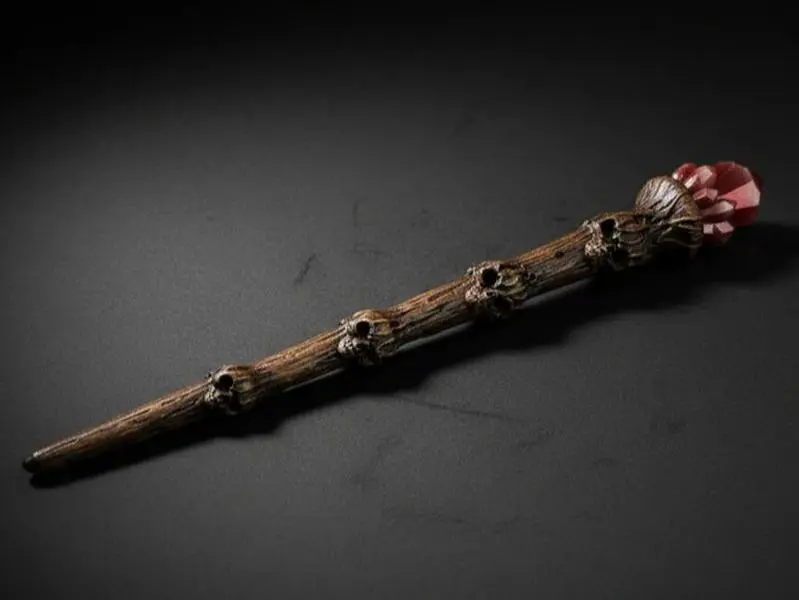 Skullroot Wand – 10-Inch Skull Carved Ritual Wand with Red Crystal Tip