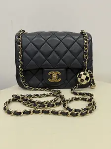 Pre-owned CHANEL Classic Mini Square Flap Bag in Dark Navy Lambskin with Gold Tone Hardware and Checkerboard Ball Charm