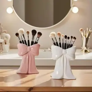Belt bow-shaped makeup storage box, makeup tools organizer, desktop decorative vase, TV cabinet decoration item for living room, makeup brush and office supplies storage box, Valentine's Day and Mother's Day home decorations