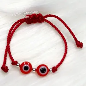 Ojito Baby Bracelet - Red Braided Design with Red and Black Beads and Decorative Elements