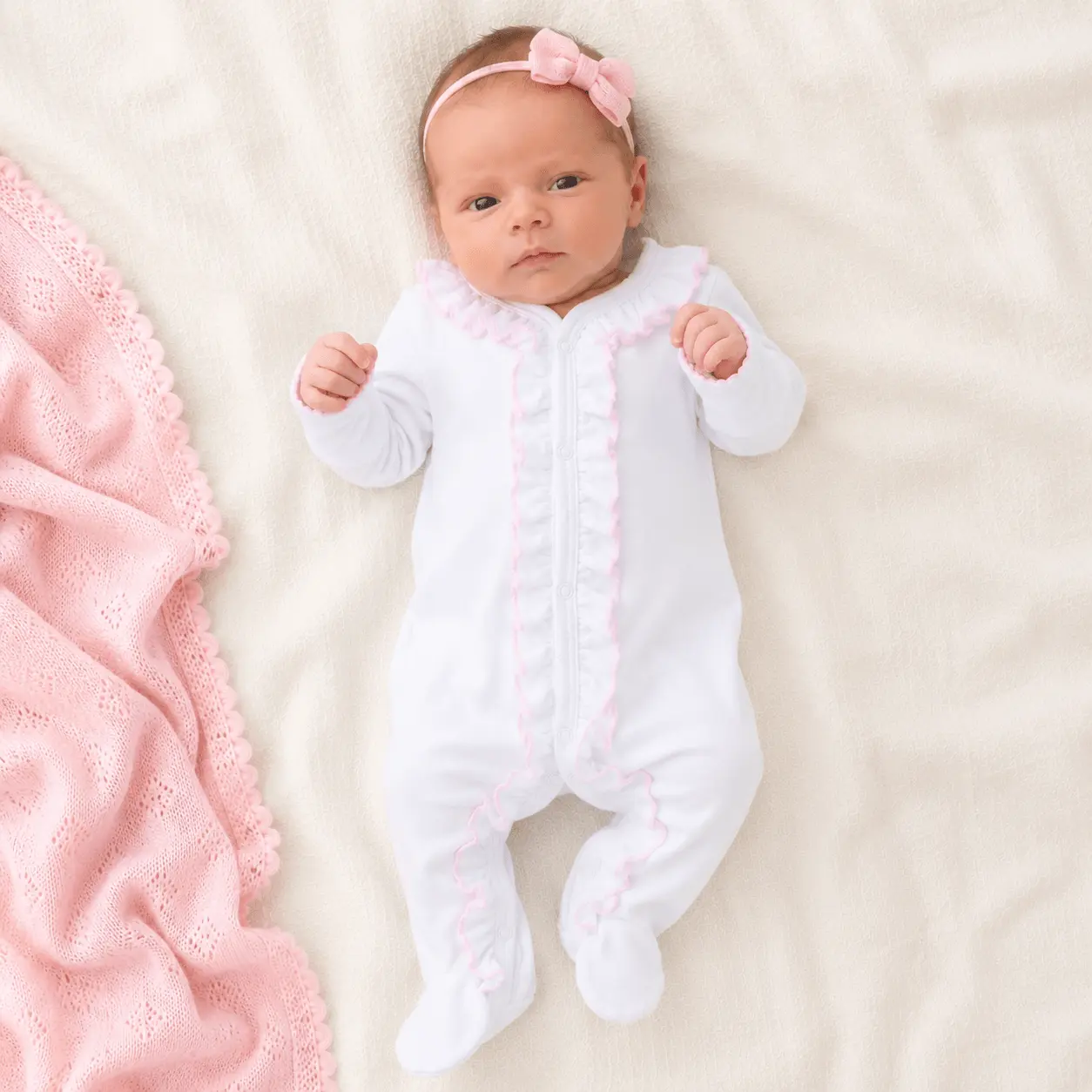 Magnolia Baby Essentials White Ruffle Footie with Pink Trim - 100% Pima Cotton, Snap Closure