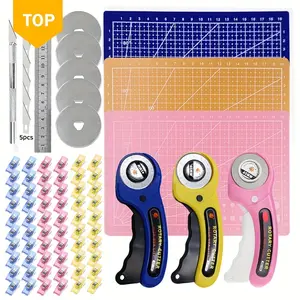Tool  A 45mm Patchwork Rotary Cutting Tool Kit with 45mm Rotary Cutter, Sharp Blades, Safety Lock, Durable and Non-Slip Design, 5 Replacement Blades, A5 Cutting Pad, Utility Knife, Steel Ruler and Sewing Clip - Perfect for Sewing, DIY Crafts and Paper Art