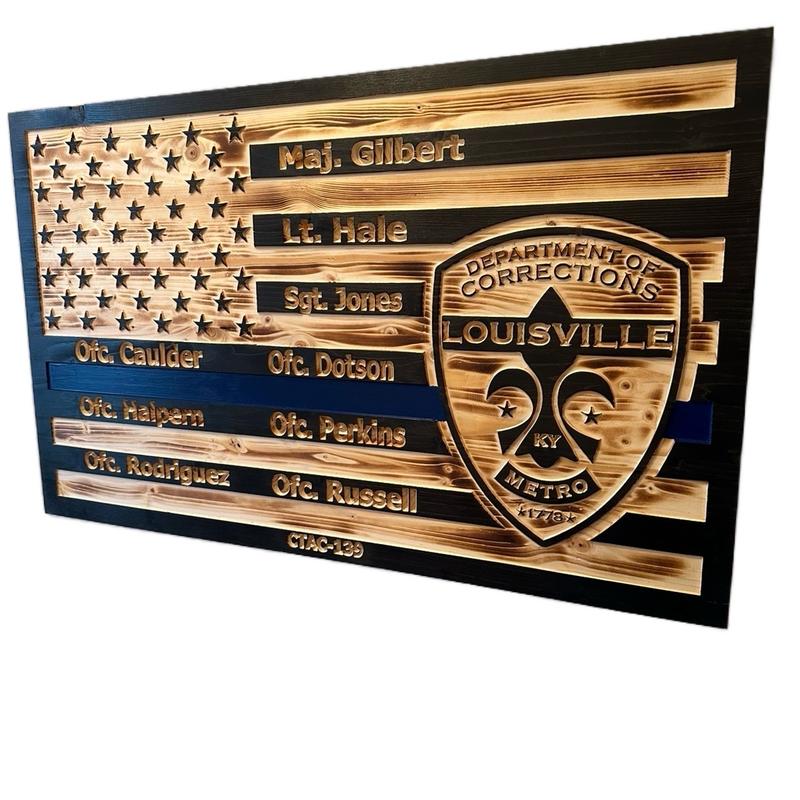 Custom engraved wooden American flags for police, firefighters, veterans or active duty military make great decor and hangable.
