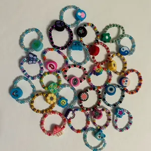 Glass beaded ring with clay charm (1 Random)