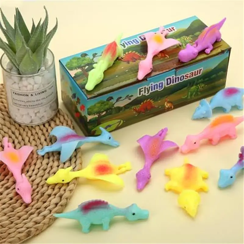 20 Pcs Slingshot Dinosaur Finger Toys, Flying Dinosaur Party Favors for Kids, Sticky Rubber Dino Fidget Toys, Funny Gag Gifts Treasure Box Classroom Prizes for Boys Girls
