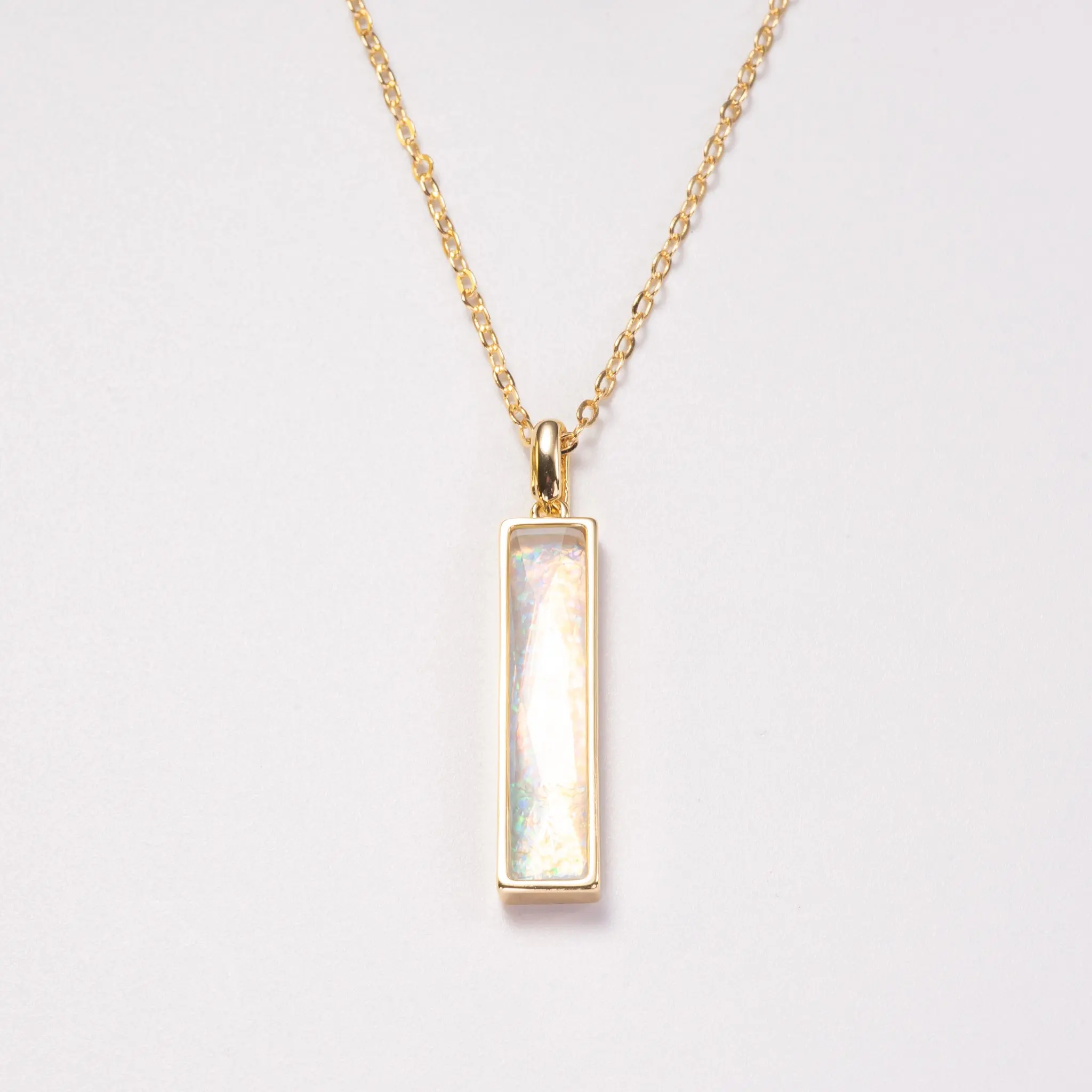 Elongated Fancy Cut simulated Welo Opal Pendant Necklace with Surgical Steel Chain 20 Inch
