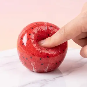 This watermelon smoothie squeeze toy is soft to the touch and makes a rustling sound when pressed.