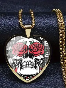 A transparent glass heart-shaped necklace with a 2D artistic skull pattern inside.