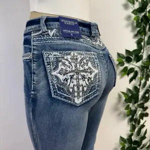 WestField Eagle Flare Jeans Women's Bottoms with Embossed Design and Button Closure - Womenswear