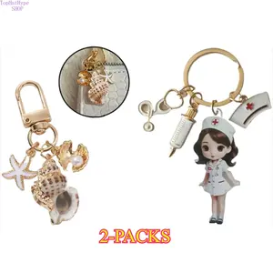 2Pcs Cute Nurse Acrylic Keychains & Seashell Starfish Pearl Shell Bag Charms, Ocean Inspired Coastal Pendant with Stethoscope Syringe Design, Fashion Decor Accessories for Purse Backpack, Perfect Graduation & Summer Beach Gifts